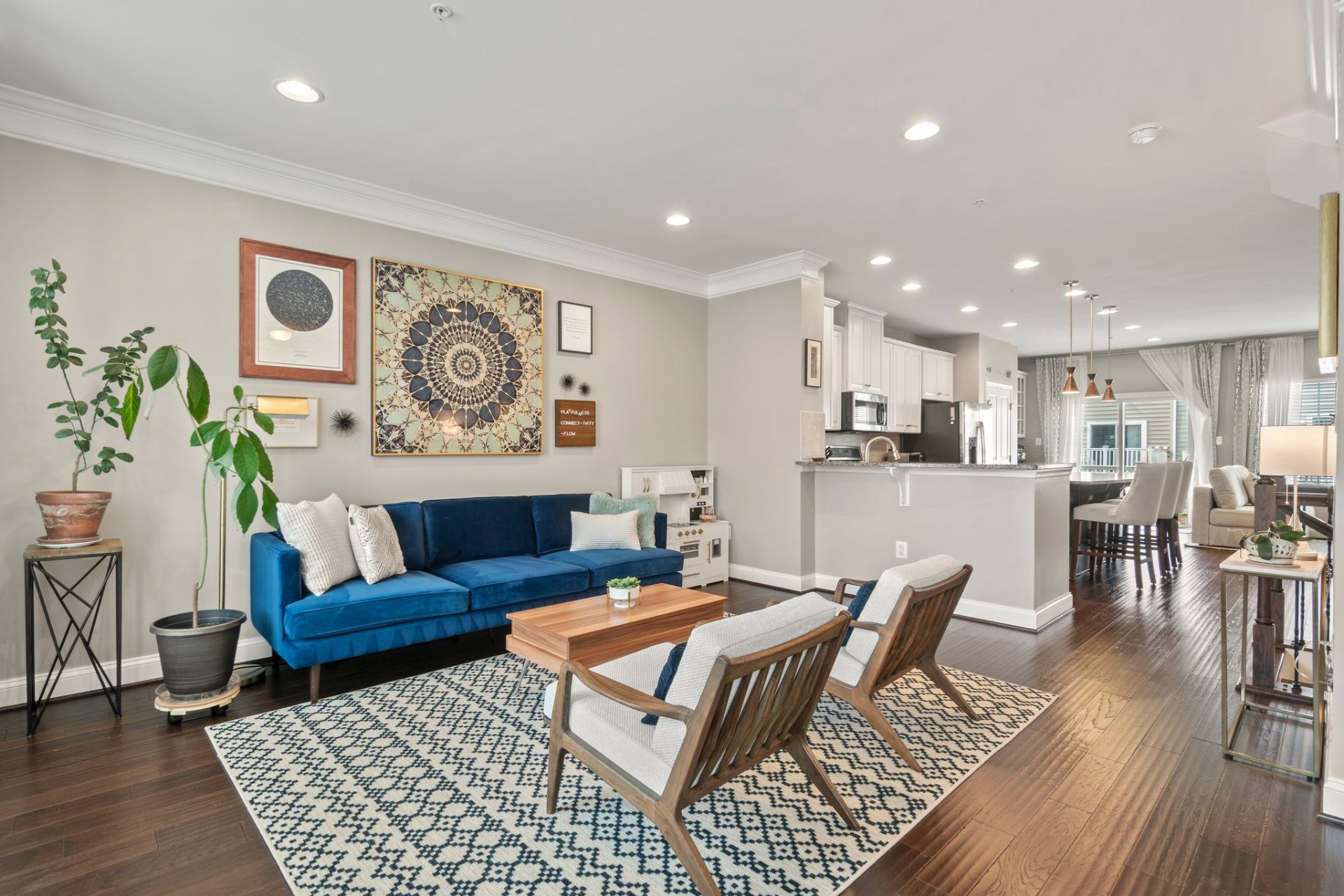 Open Floor – Blue Sofa & Kitchen